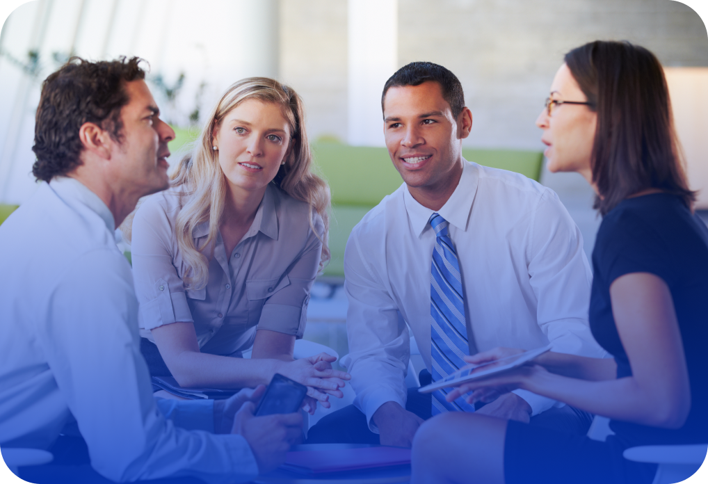 A business team collaborates during a meeting, showcasing vet training resources for professional development.
